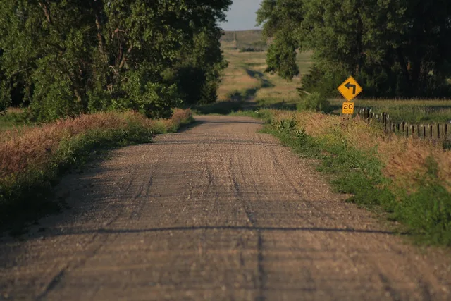 rural, nebraska, gravel road, keya paha county, road sign, speed limit, nebraska, nebraska, nebraska, nebraska, nebraska, gravel road. Mobile Notary Rural Travel Fees: A Quote Framework